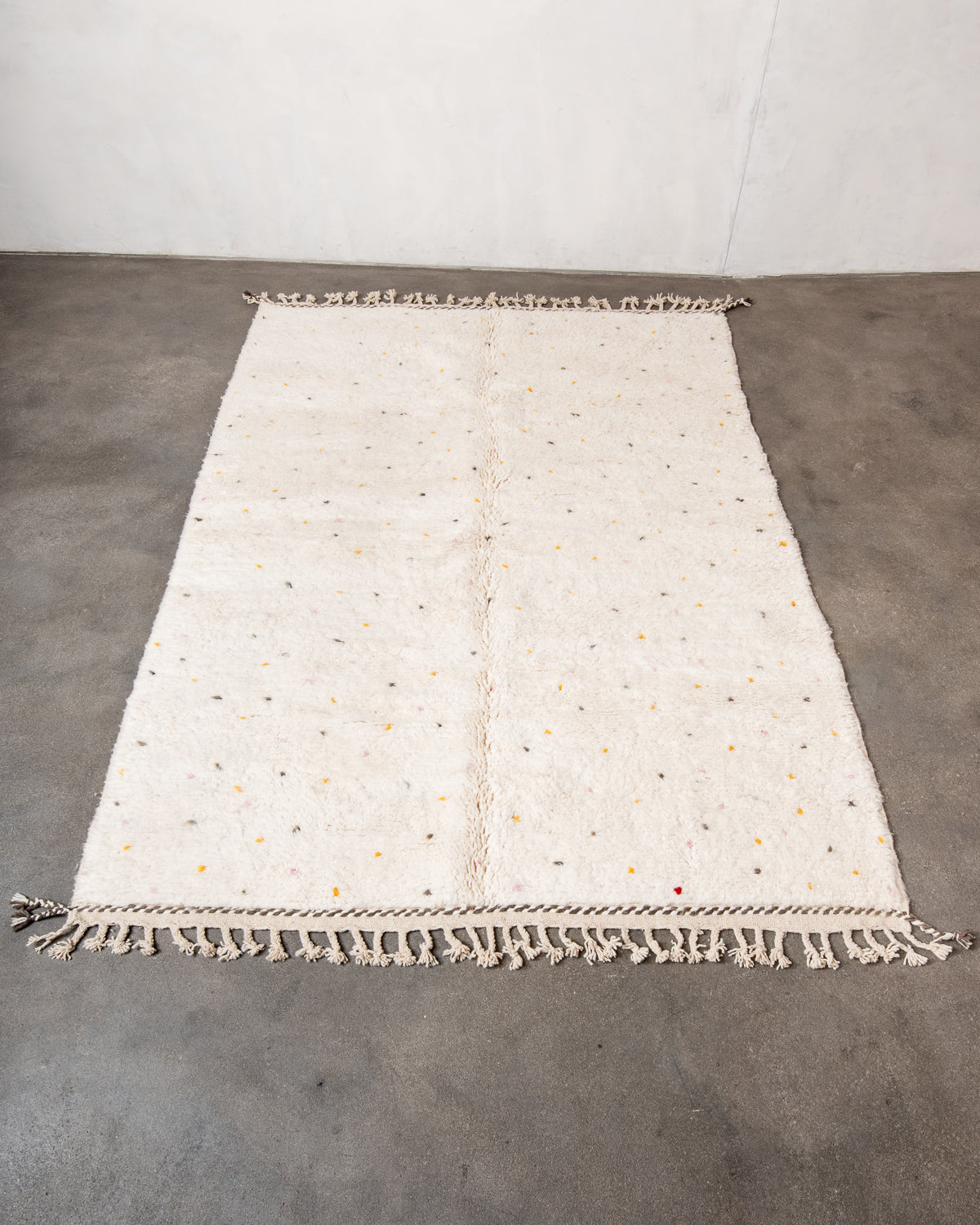 Modern, designer, handcrafted Berber rug from Morocco. Beniourain carpet with beautiful colours and patterns and fluffy wool texture.